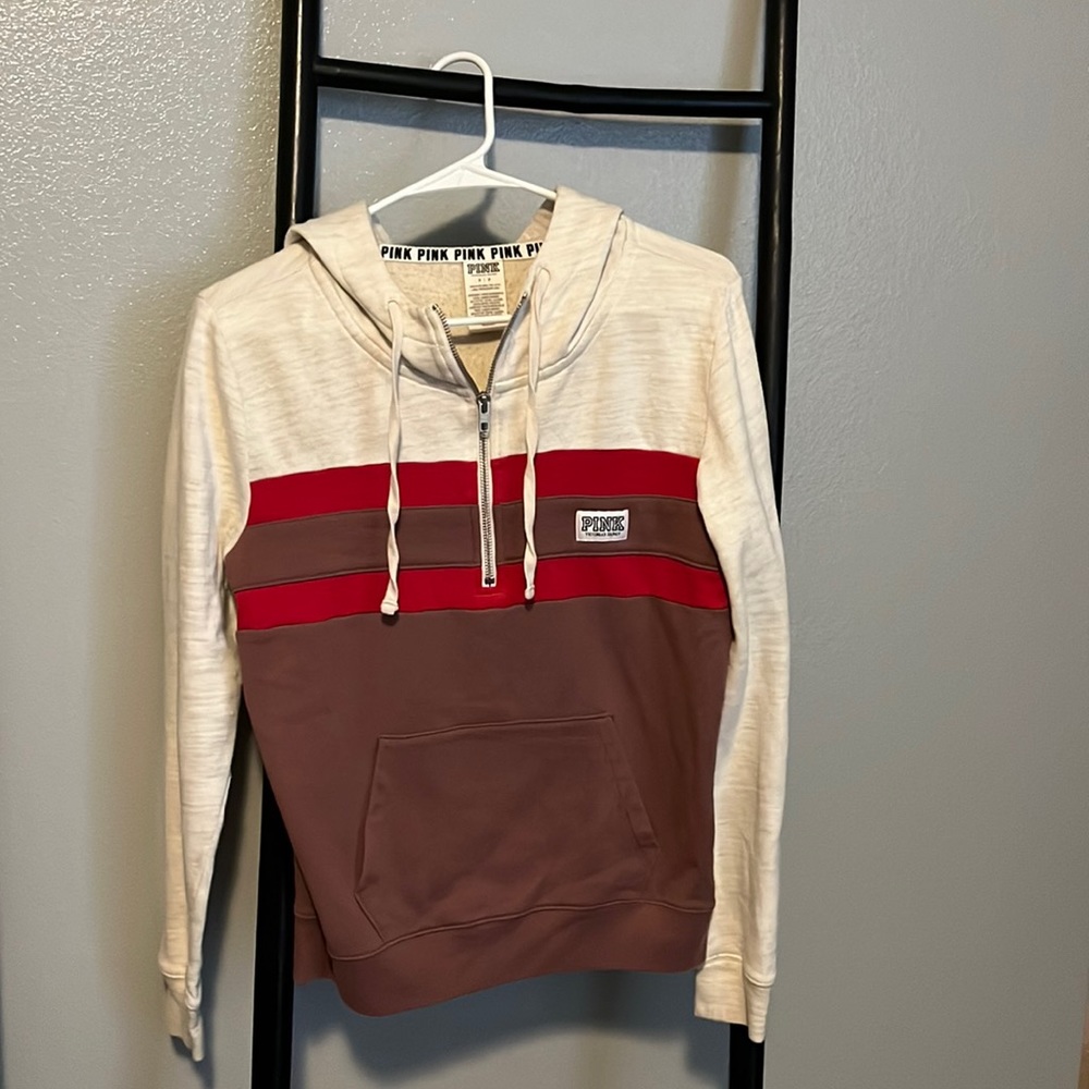 Victoria’s Secret pink sweater.